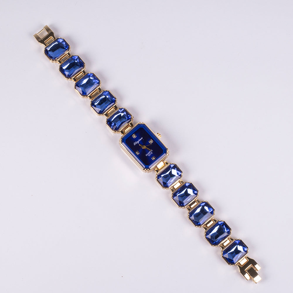 Uhr aus goldplattierter Legierung mit blauem Emporia®-Kristall