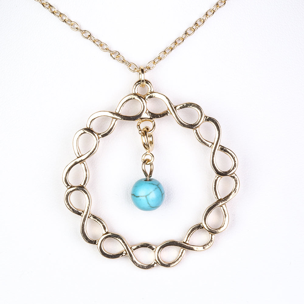 Schmuckgarnitur aus aus goldplattierter Legierung mit rotem Achat und Amethyst