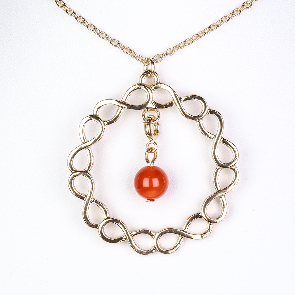 Schmuckgarnitur aus aus goldplattierter Legierung mit rotem Achat und Amethyst