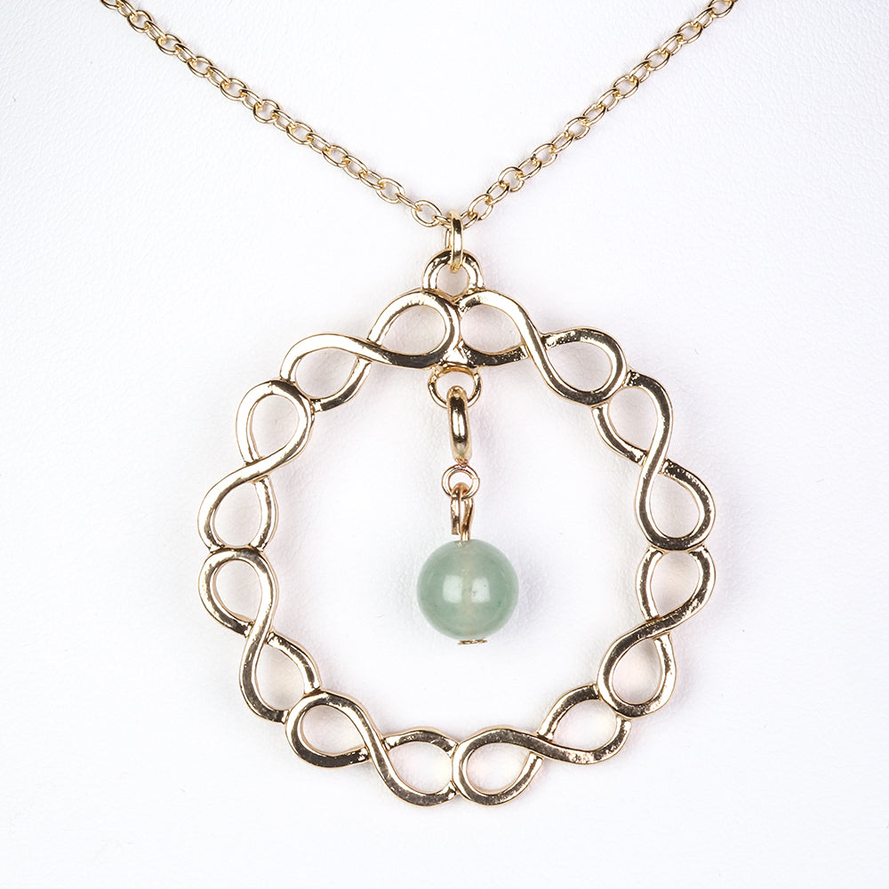 Schmuckgarnitur aus aus goldplattierter Legierung mit rotem Achat und Amethyst