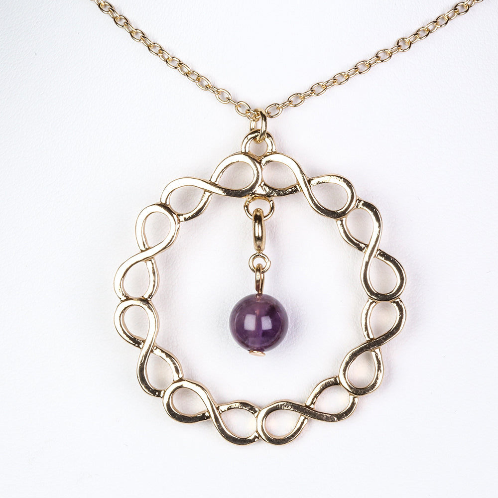 Schmuckgarnitur aus aus goldplattierter Legierung mit rotem Achat und Amethyst