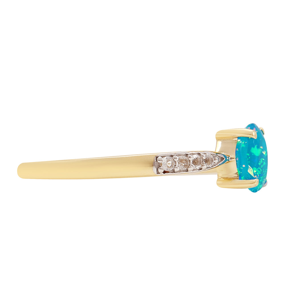 Goldring mit äthiopischem Paraiba-Blauopal und weißem Topas