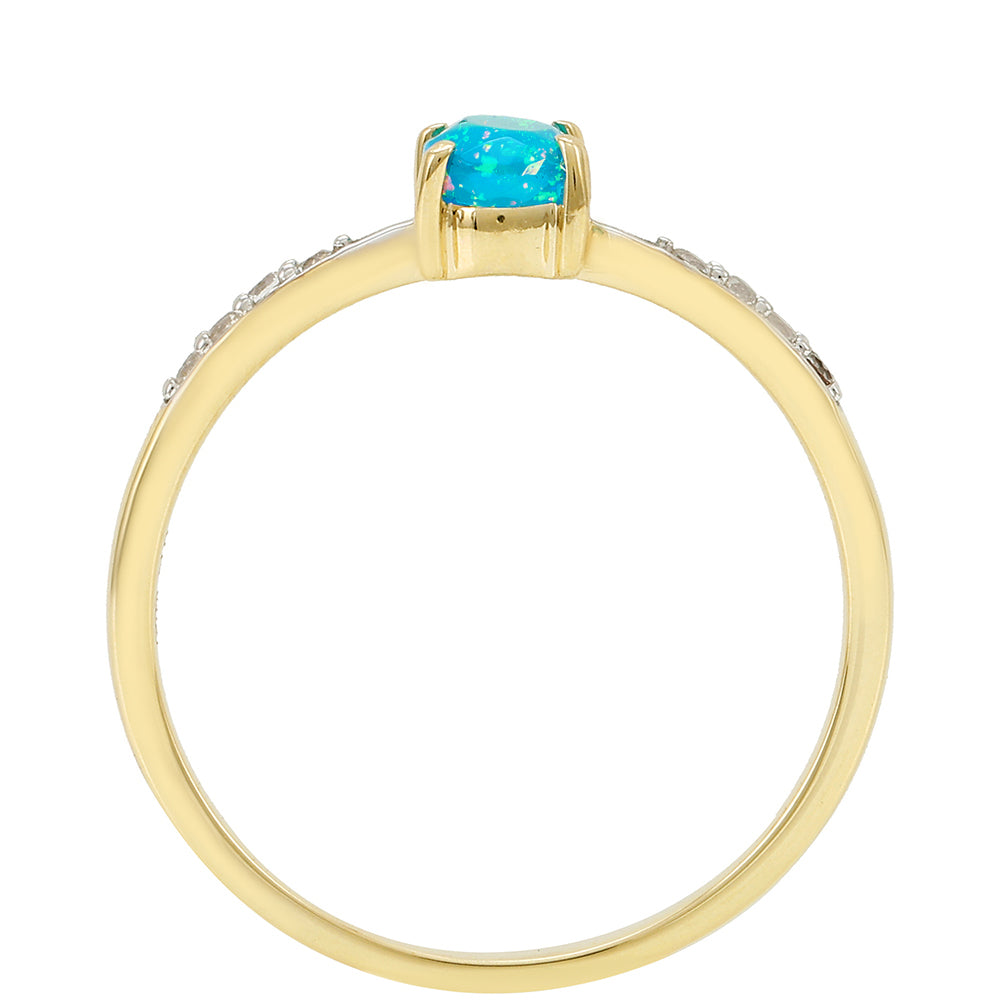 Goldring mit äthiopischem Paraiba-Blauopal und weißem Topas