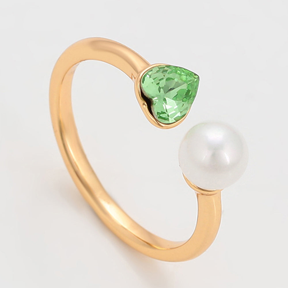 Ring aus goldplattierterr Legierung mit Glasperle und grünem Emporia® Kristall