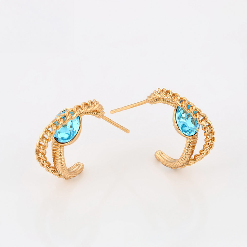 Ohrringe aus goldplattierter Legierung mit blauem Emporia®-Kristall