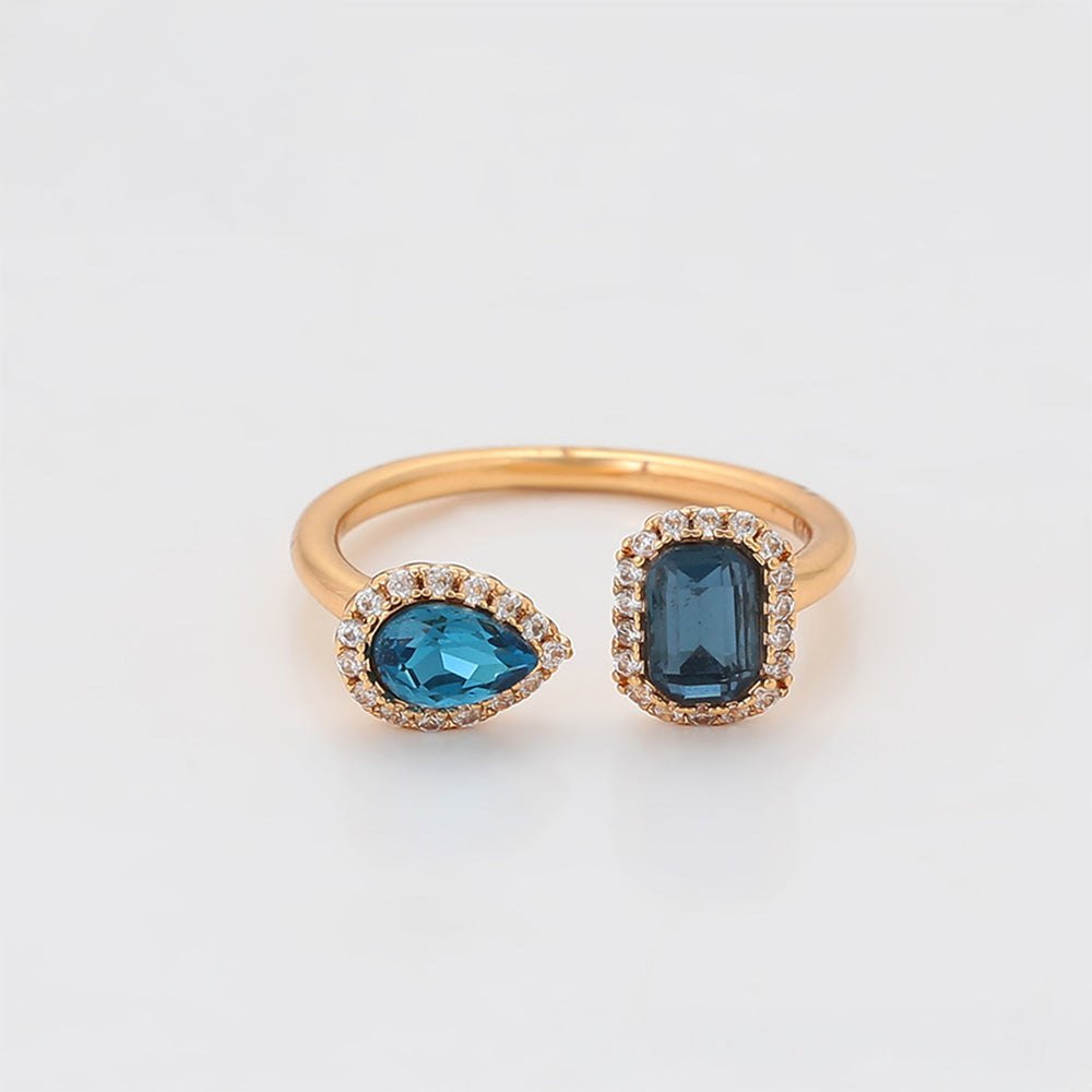Ring aus goldplattierterr Legierung mit blauem Emporia®-Kristall und weißem Emporia® Kristall