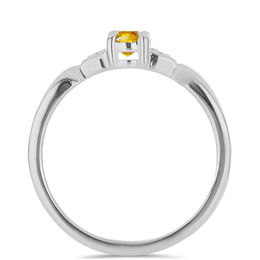 Silberring mit Zitrin aus dem Ural und weißem Topas