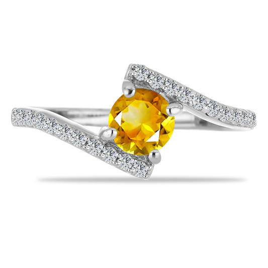 Silberring mit Zitrin aus dem Ural und weißem Topas