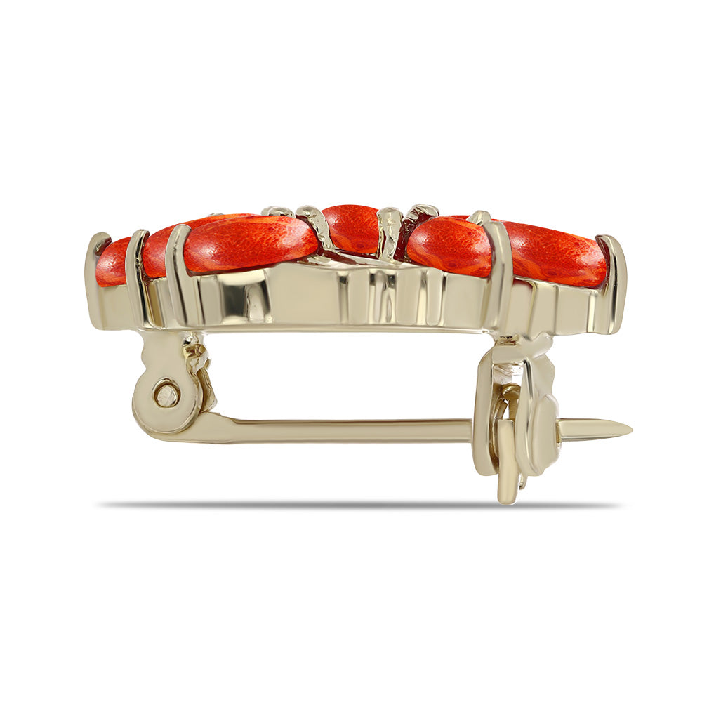 Goldplattierte Silberbrosche mit roter Schwammkoralle