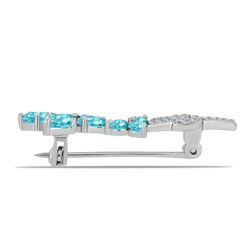 Silberbrosche mit Paraiba Quarz und weißem Topas