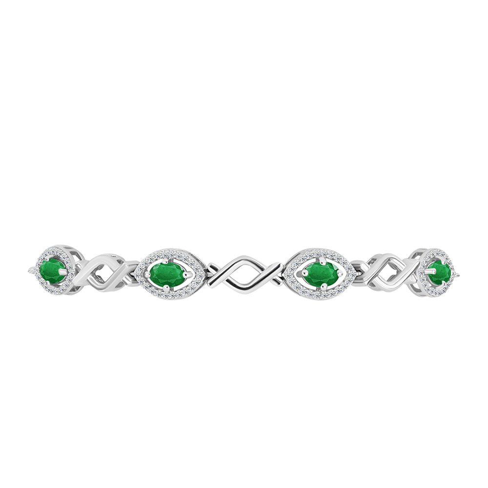 Silberarmband mit sambischem Smaragd und weißem Topas