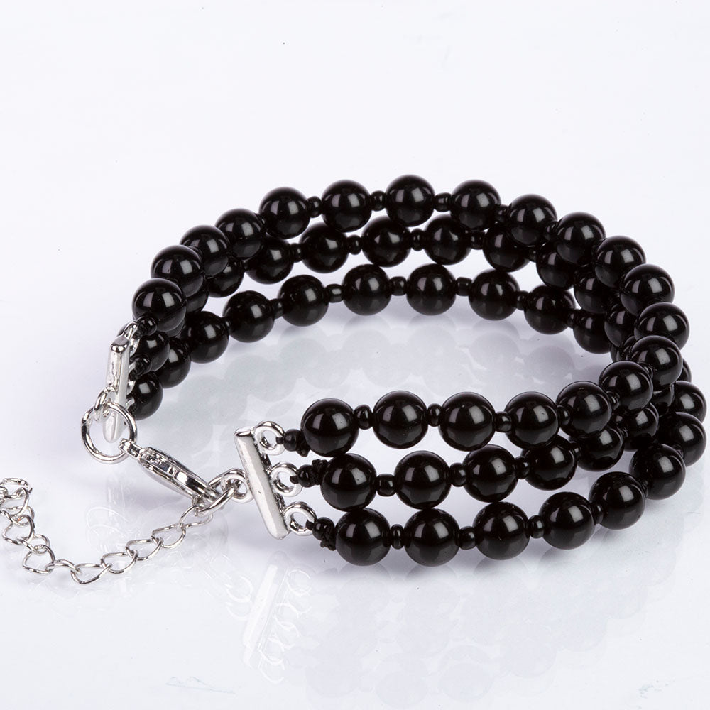 Armband aus goldplattiertesr Legierung mit schwarzem Onyx