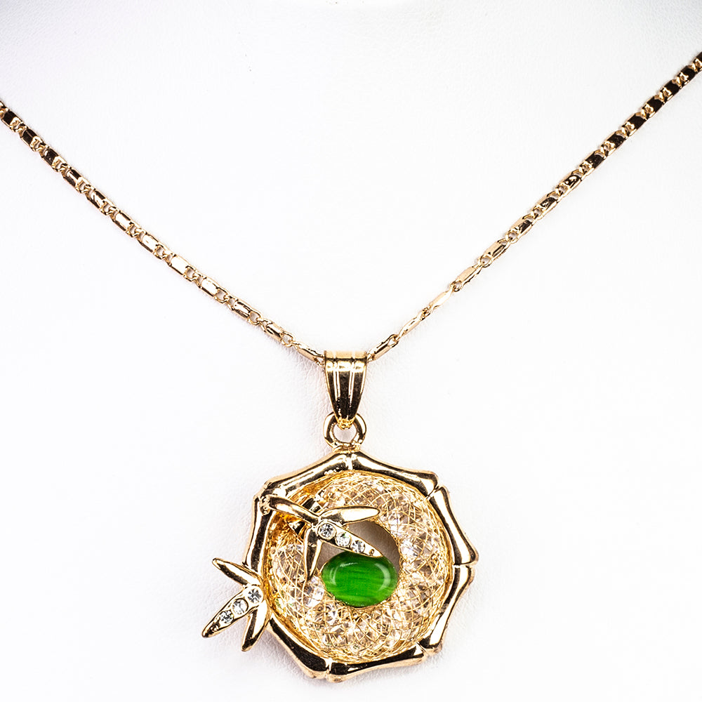 Schmuckgarnitur aus aus goldplattierter Legierung mit grünem Emporia® Kristall und weißem Emporia® Kristall