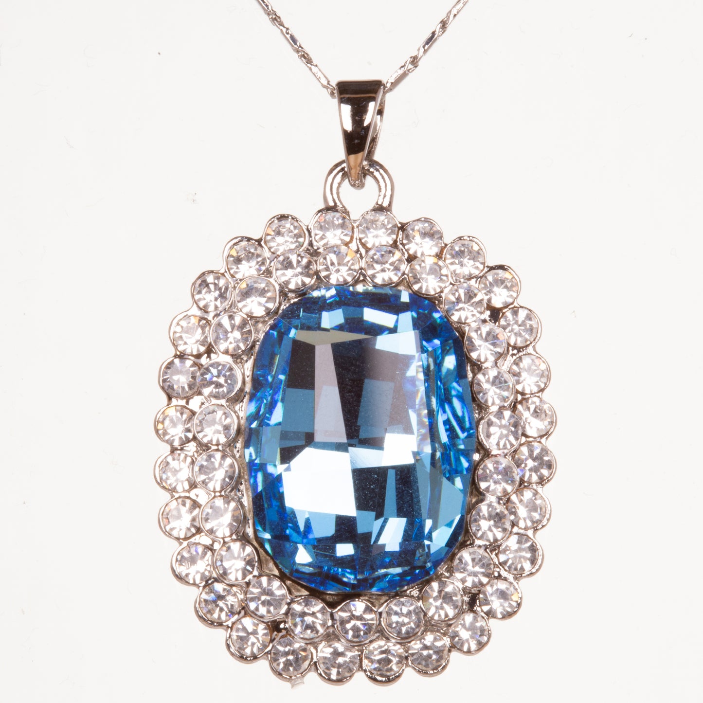 Schmuckgarnitur aus aus weißgoldplattierter Legierung mit blauem Emporia®-Kristall