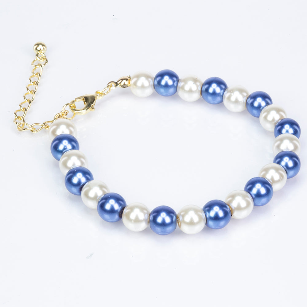 Schmuckgarnitur aus aus goldplattierter Legierung mit weißer Perle und blauem Emporia®-Kristall