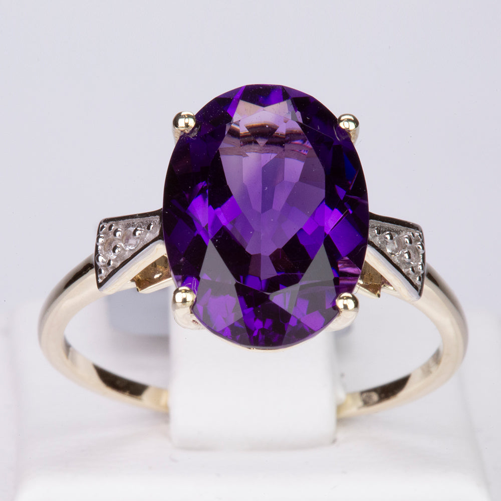 Goldring mit marokkanischem Amethyst und weißem Topas 1