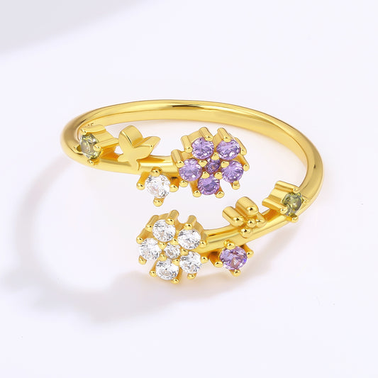 Ring aus goldplattierterr Legierung mit weißem Emporia® Kristall und purpurfarbenem Emporia® Kristall