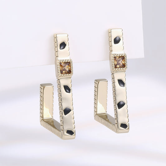 Ohrringe aus goldplattierter Legierung mit braunem Emporia® Kristall