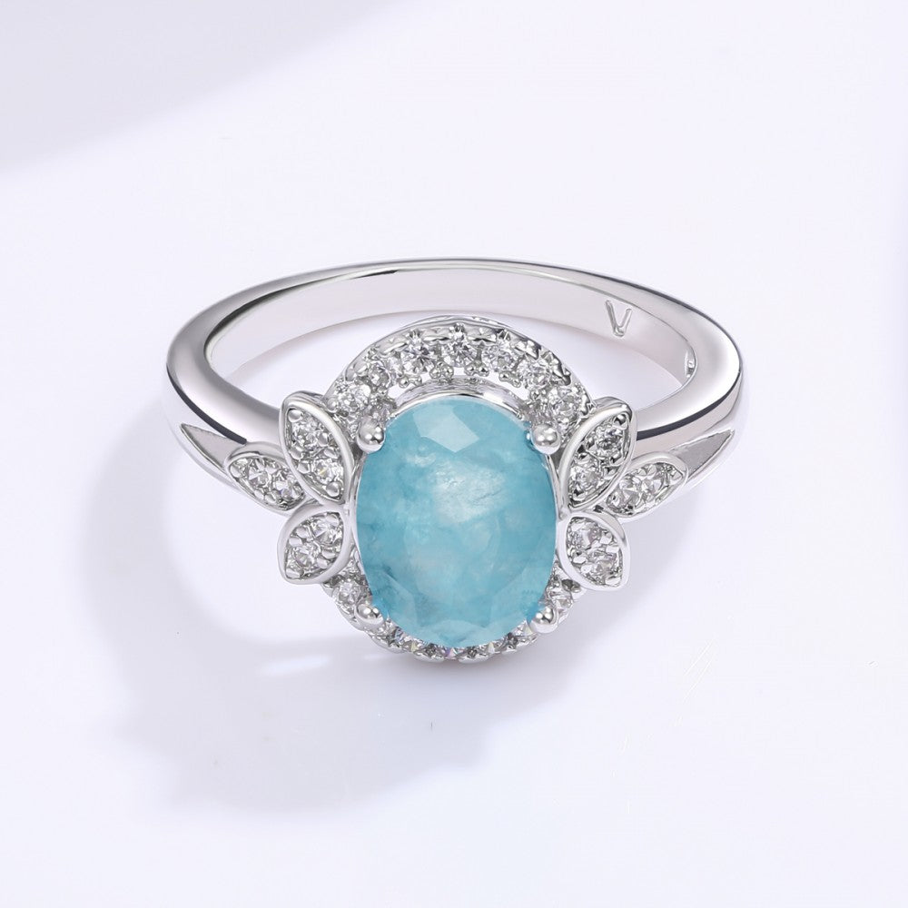 Ring aus goldplattierterr Legierung mit blauem Emporia®-Kristall