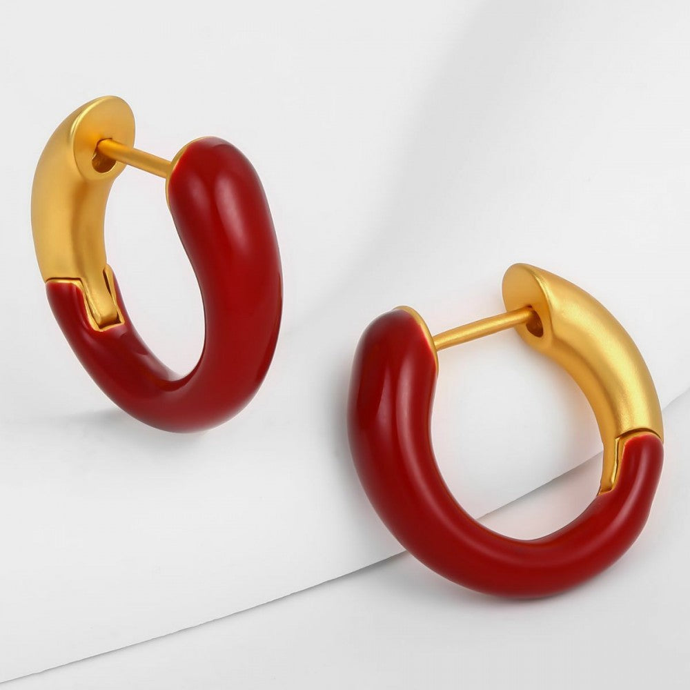 Ohrringe aus goldplattierter Legierung mit rotem Emporia®-Kristall