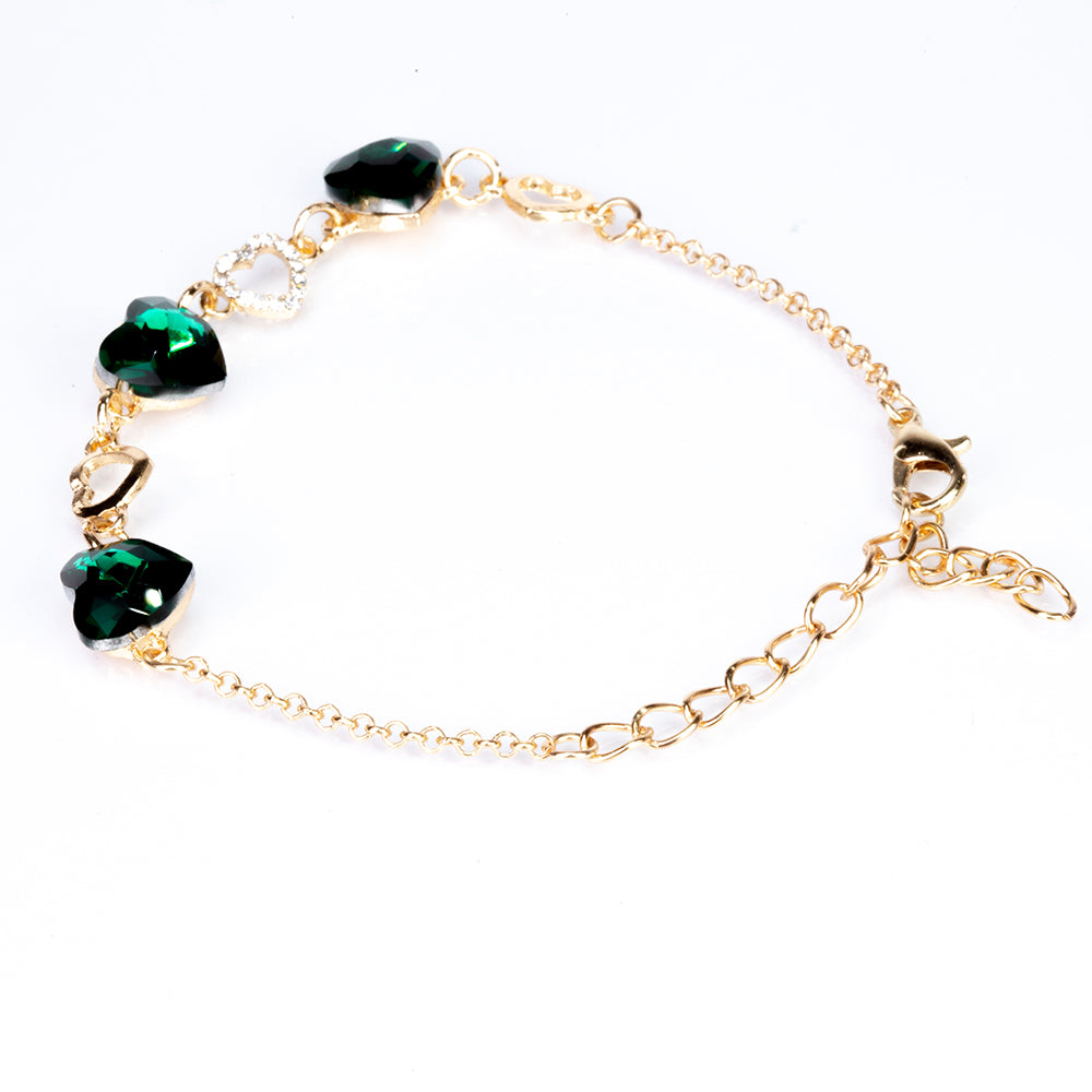 Uhr aus goldplattierter Legierung mit blauem Emporia®-Kristall