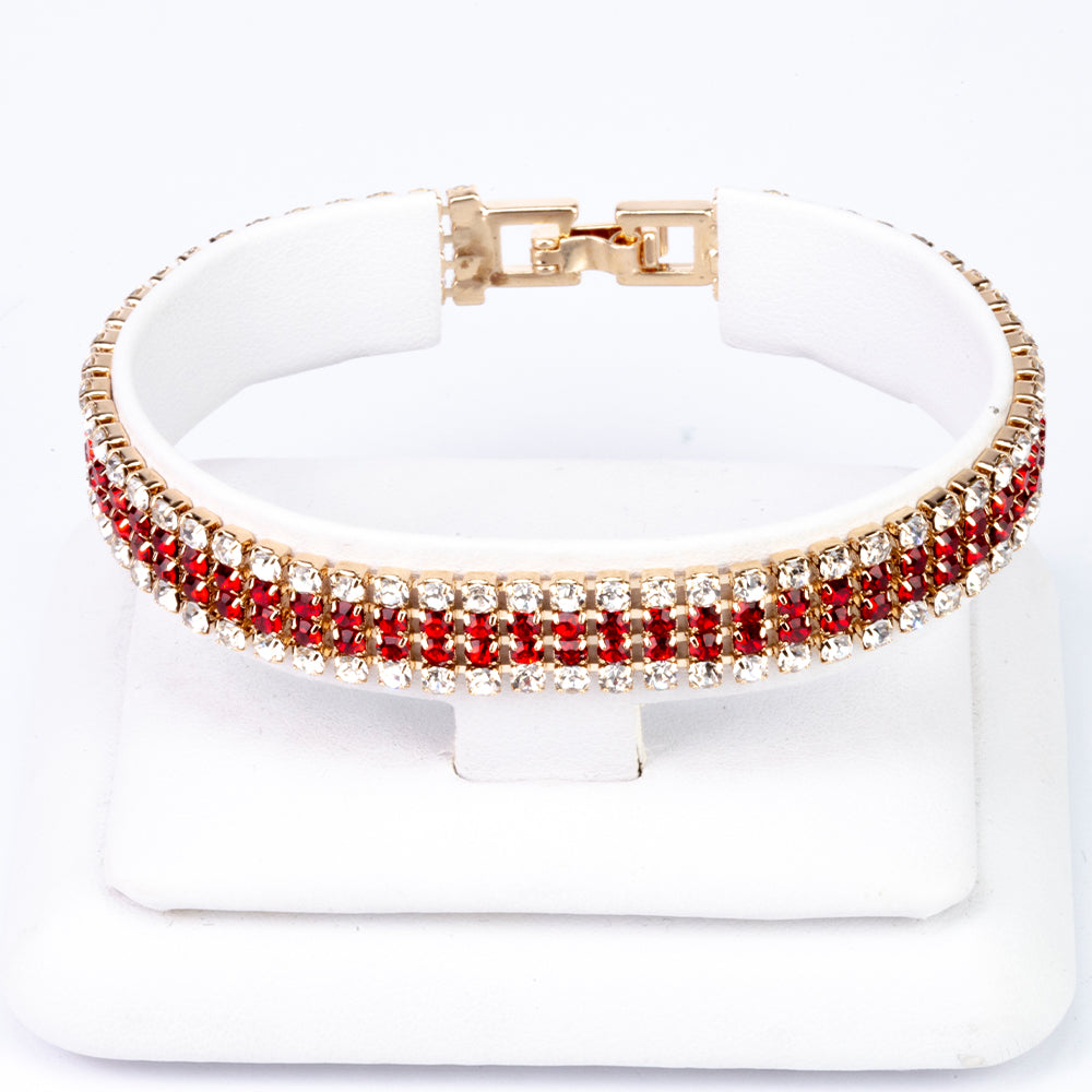 Uhr aus goldplattierter Legierung mit rotem Emporia®-Kristall 8 