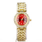 Uhr aus goldplattierter Legierung mit rotem Emporia®-Kristall und weißem Emporia® Kristall