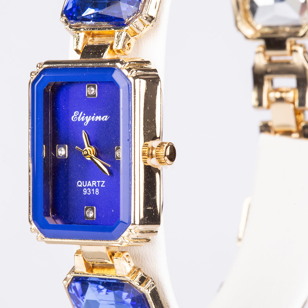 Uhr aus goldplattierter Legierung mit blauem Emporia®-Kristall 3 