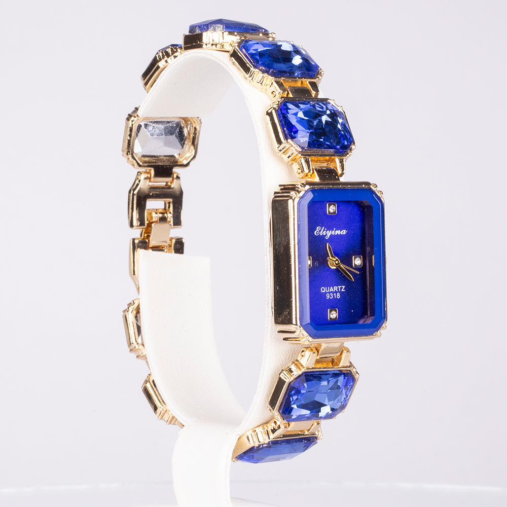 Uhr aus goldplattierter Legierung mit blauem Emporia®-Kristall 1 