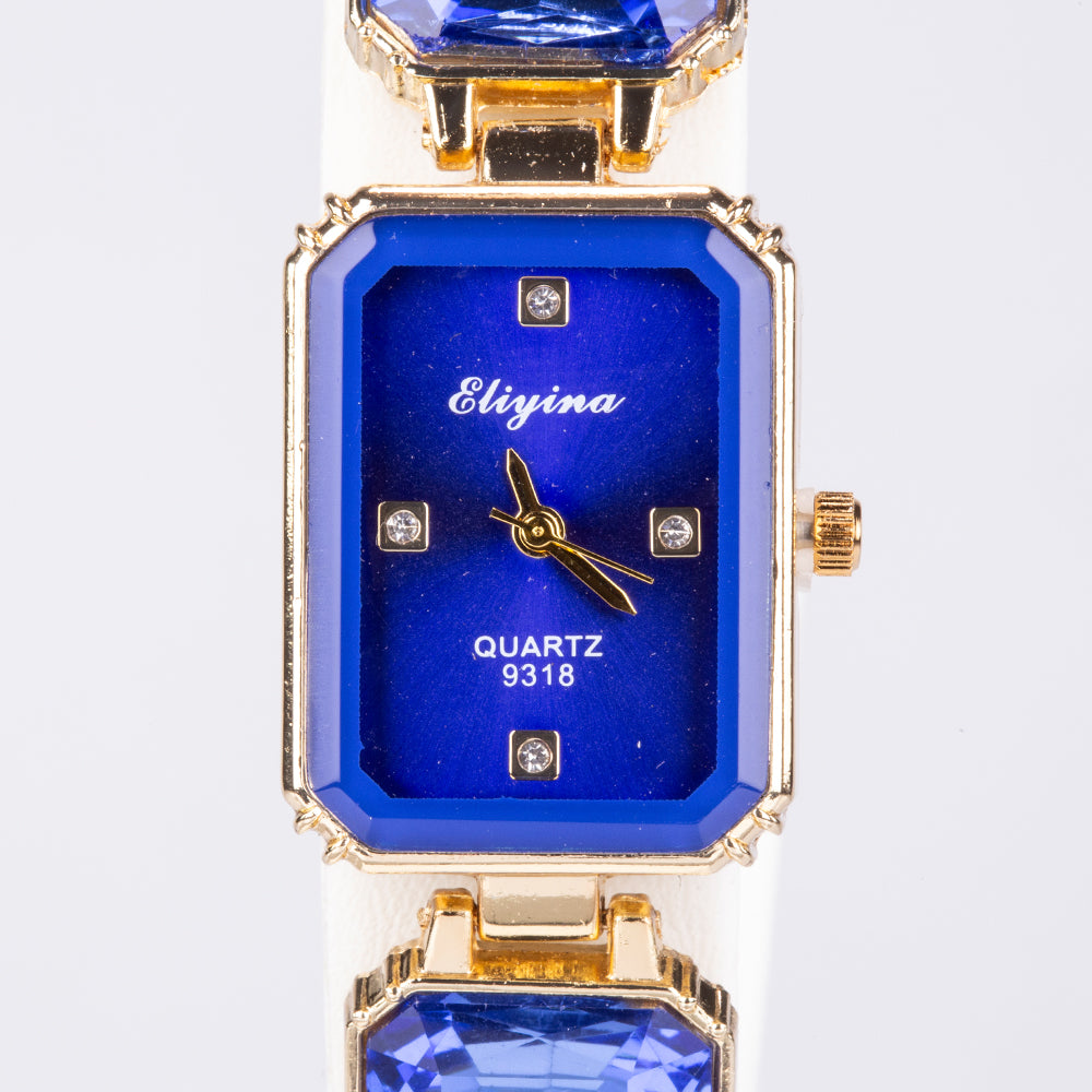 Uhr aus goldplattierter Legierung mit blauem Emporia®-Kristall 4 