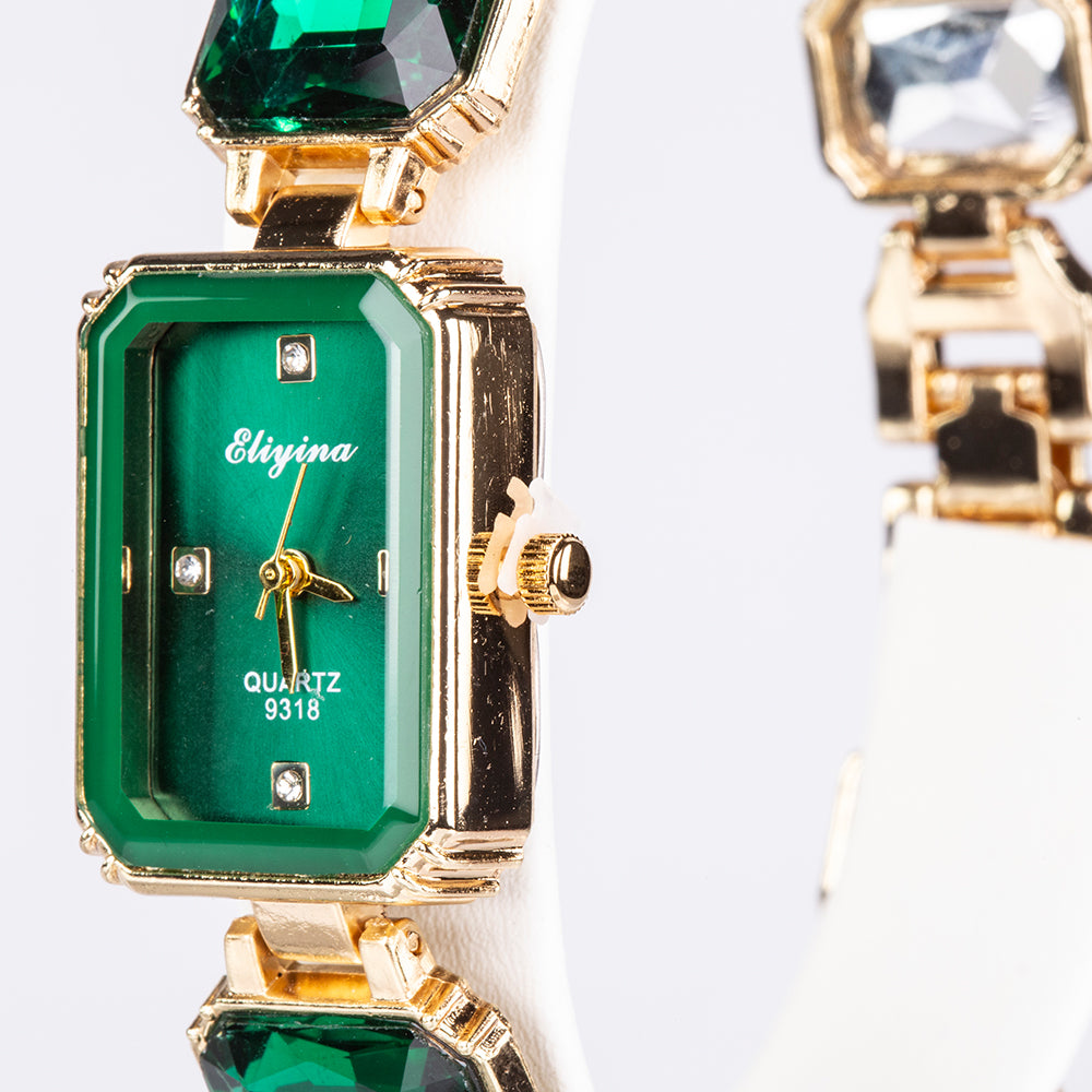 Uhr aus goldplattierter Legierung mit grünem Emporia® Kristall 2 