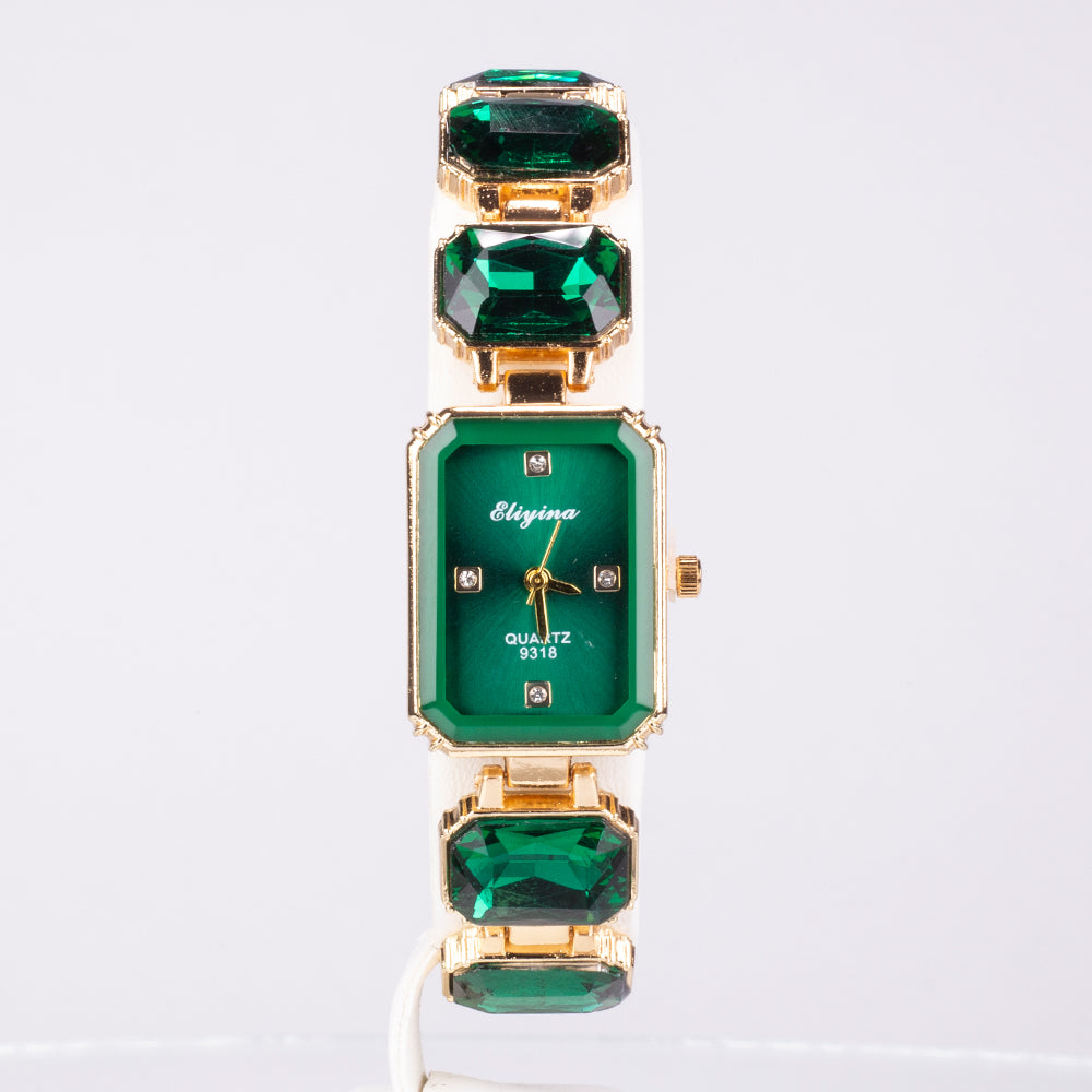 Uhr aus goldplattierter Legierung mit grünem Emporia® Kristall