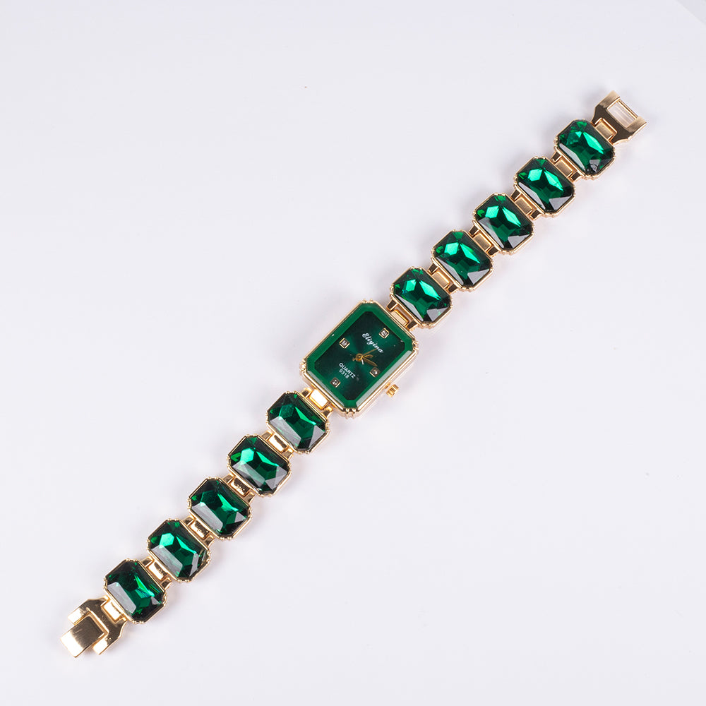 Uhr aus goldplattierter Legierung mit grünem Emporia® Kristall 5 