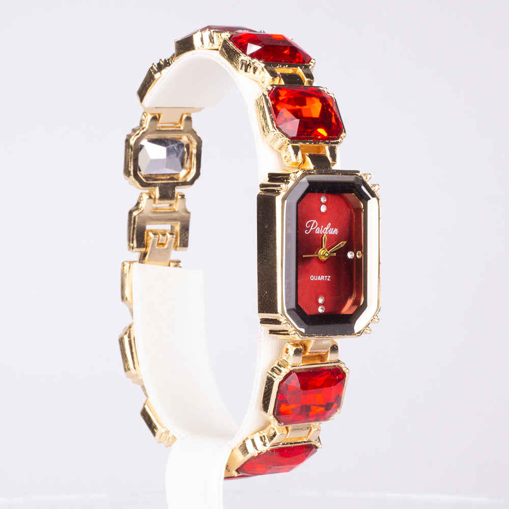 Uhr aus goldplattierter Legierung mit rotem Emporia®-Kristall 1 