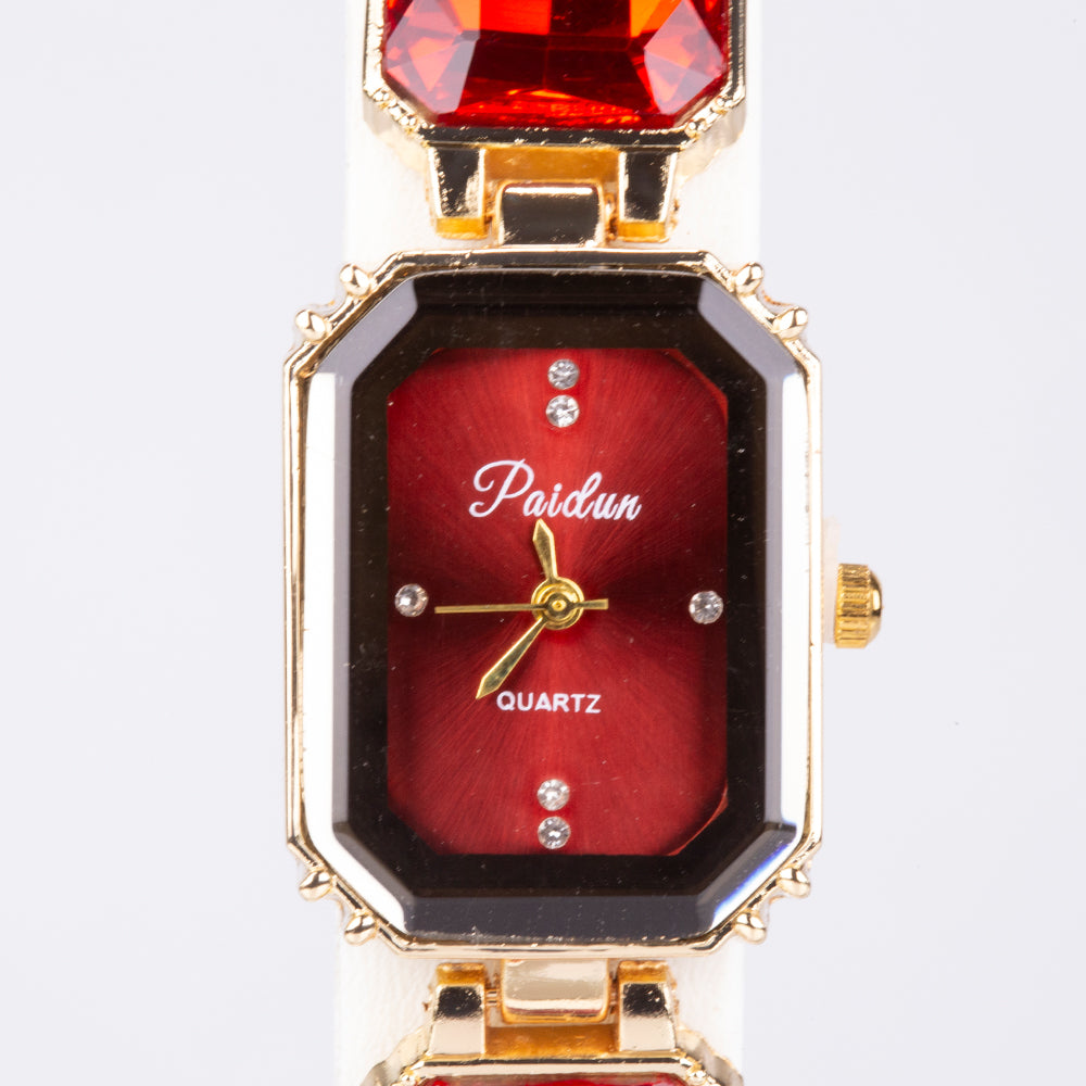 Uhr aus goldplattierter Legierung mit rotem Emporia®-Kristall 2 