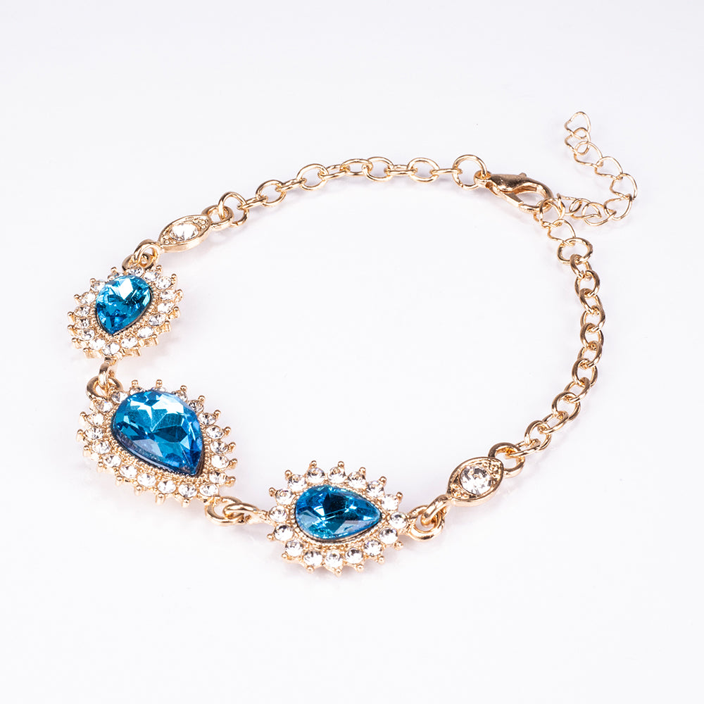 Schmuckgarnitur aus aus goldplattierter Legierung mit blauem Emporia®-Kristall und weißem Emporia® Kristall 4 