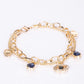 Armband aus goldplattiertesr Legierung mit Saphir
