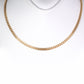 Schmuckgarnitur aus aus goldplattierter Legierung mit Glasperle