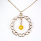 Schmuckgarnitur aus aus goldplattierter Legierung mit rotem Achat und Amethyst