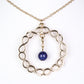 Schmuckgarnitur aus aus goldplattierter Legierung mit rotem Achat und Amethyst