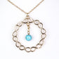 Schmuckgarnitur aus aus goldplattierter Legierung mit rotem Achat und Amethyst