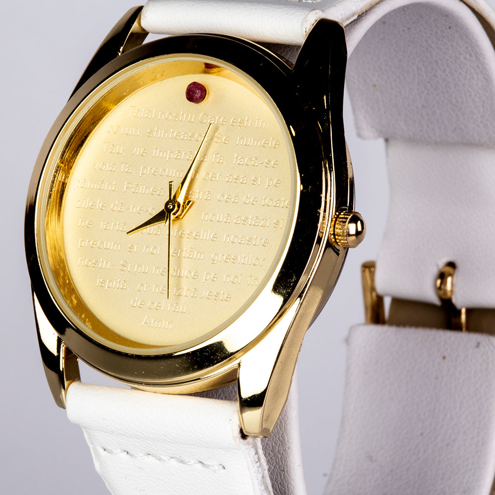 Uhr aus goldplattierter Legierung mit Rubin