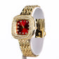 Uhr aus goldplattierter Legierung mit Rubin und weißem Emporia® Kristall