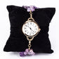 Uhr aus goldplattierter Legierung mit Türkis und Amethyst