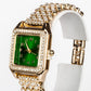 Uhr aus goldplattierter Legierung mit grünem Emporia® Kristall und weißem Emporia® Kristall