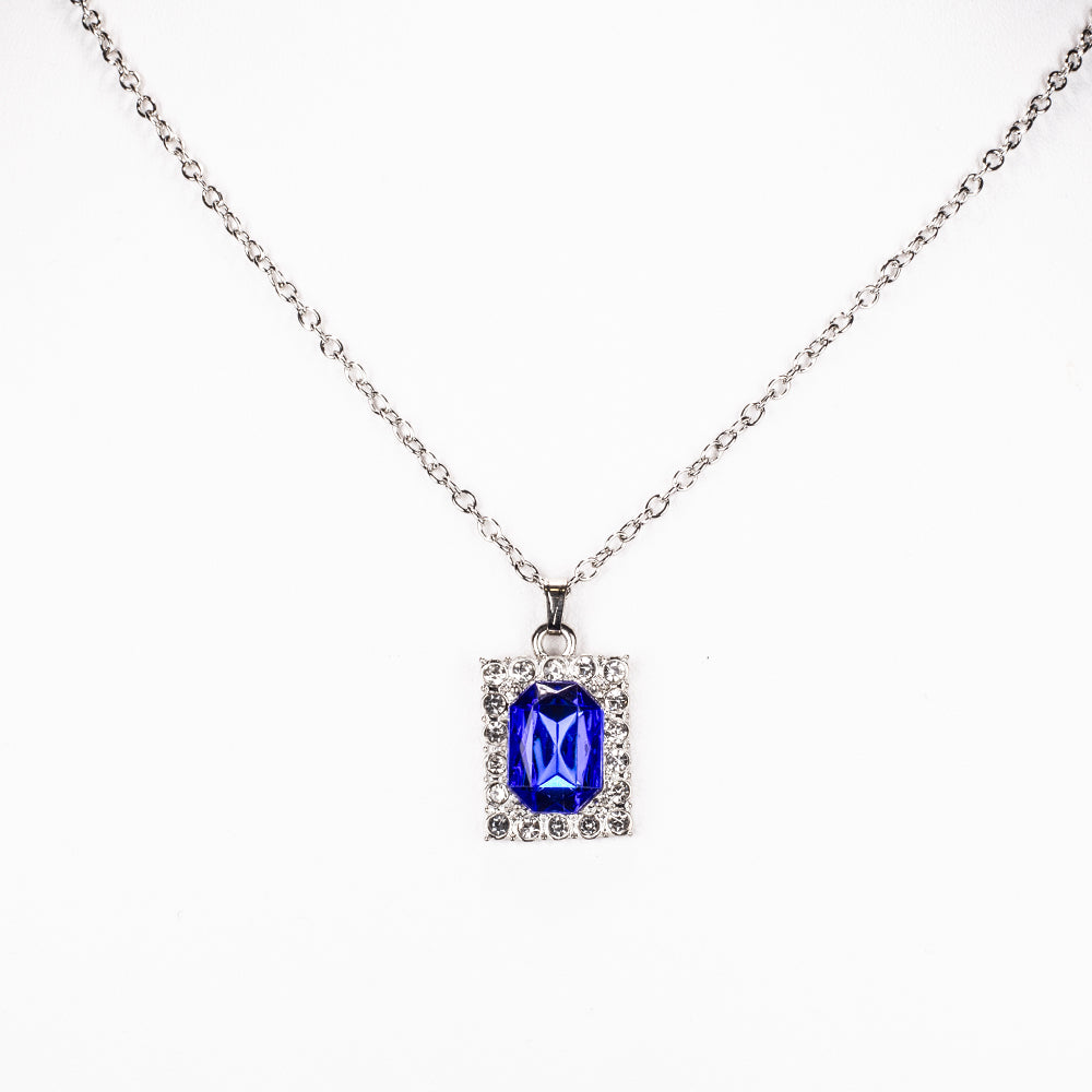 Uhr aus goldplattierter Legierung mit blauem Emporia®-Kristall und weißem Emporia® Kristall