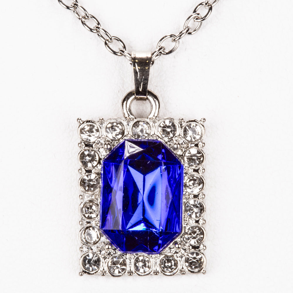 Uhr aus goldplattierter Legierung mit blauem Emporia®-Kristall und weißem Emporia® Kristall