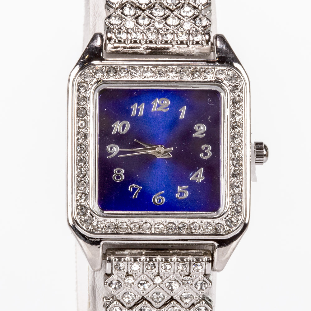 Uhr aus goldplattierter Legierung mit blauem Emporia®-Kristall und weißem Emporia® Kristall