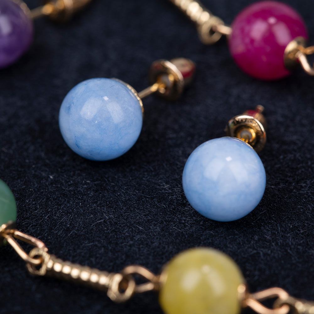 Schmuckgarnitur aus aus goldplattierter Legierung mit Amethyst und Jade