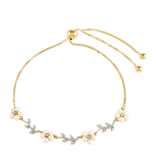 Goldplattiertes Silberarmband mit barocker Süßwasserzuchtperle und weißem Topas